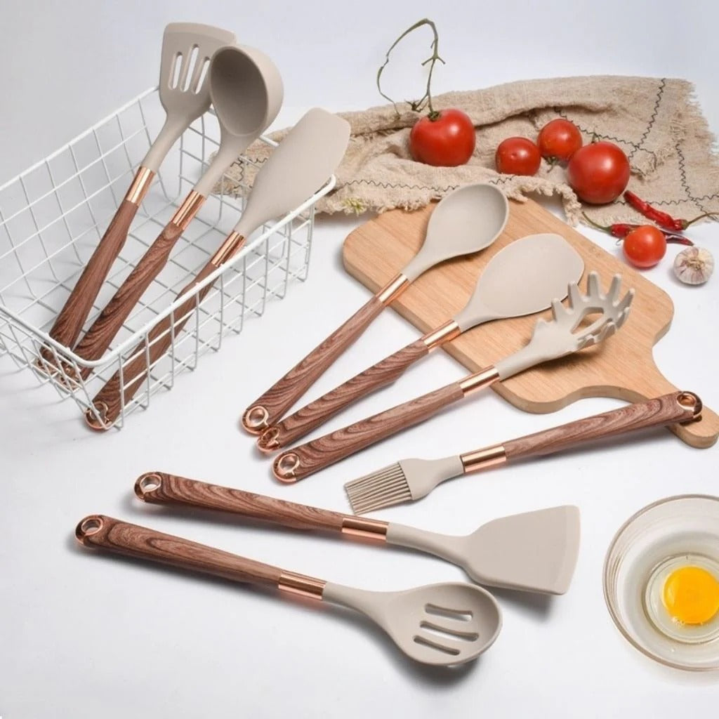 Close-up of heat-resistant silicone heads and wood grain handles