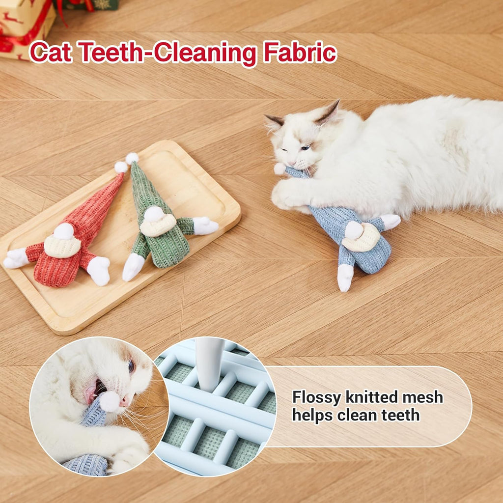 Kitten kicking and chewing Christmas catnip toy